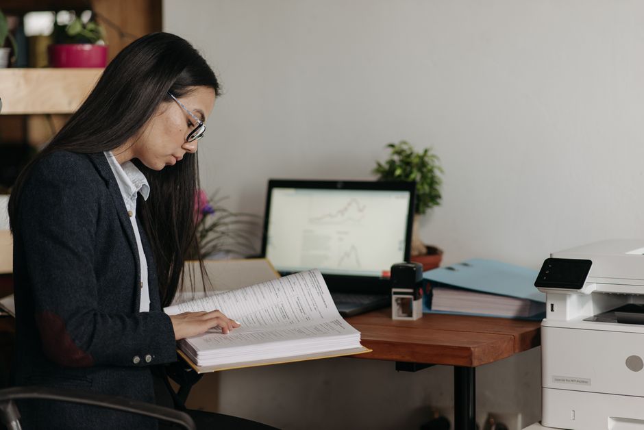 Person working with printed documents
