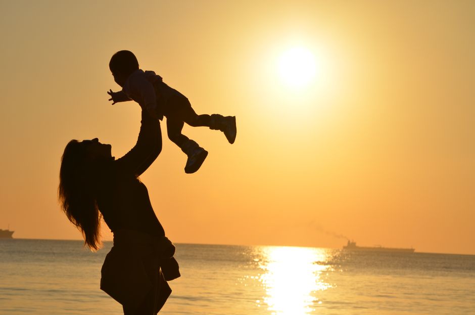 Woman with child at home