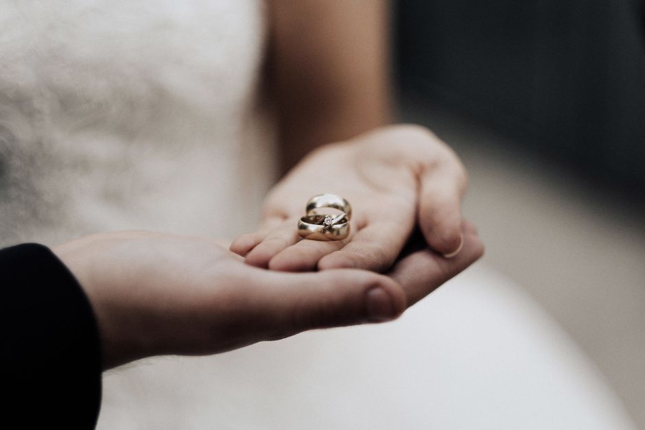Couple hands with rings